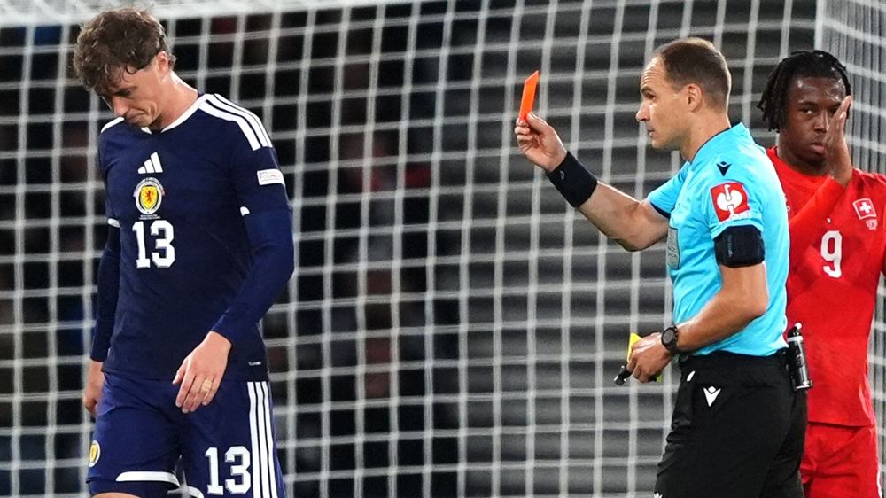 Ten-man Scotland beaten by Switzerland in Pocognoli's first match at Hampden
